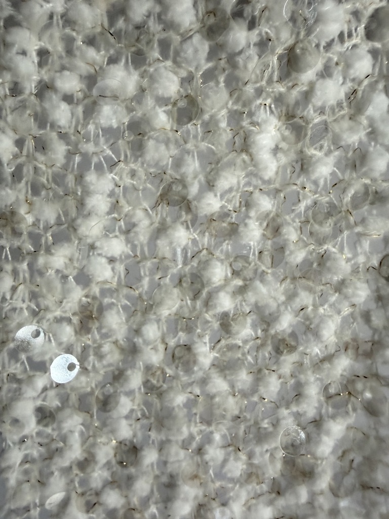 47710 — Tessuto tweed con paillettes trasparenti